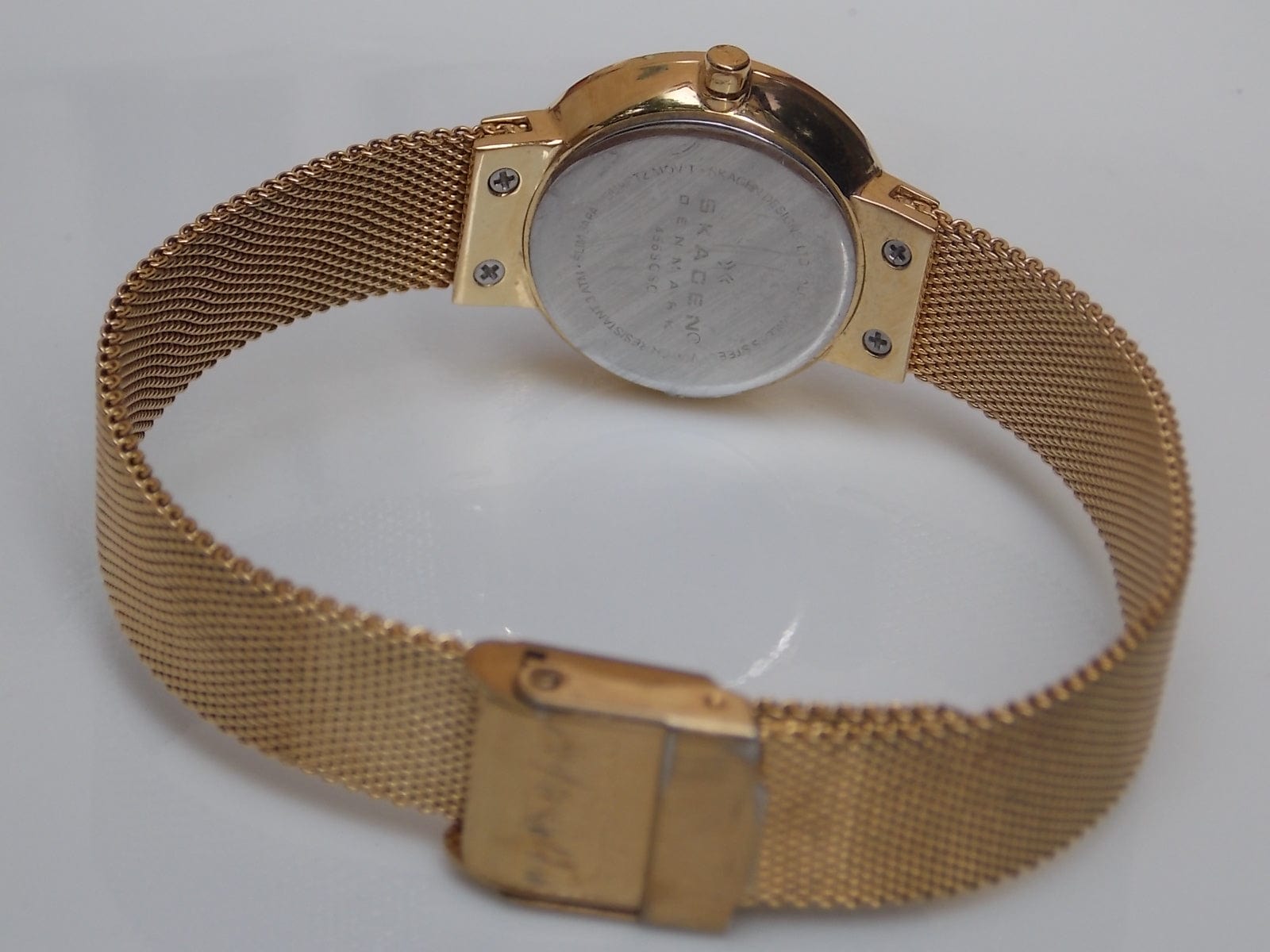 I Like Mikes Mid Century Modern Watches Skagen Women's Goldtone Round Gold Dial Jewel Number Markers Facet Cut Border Mesh Band
