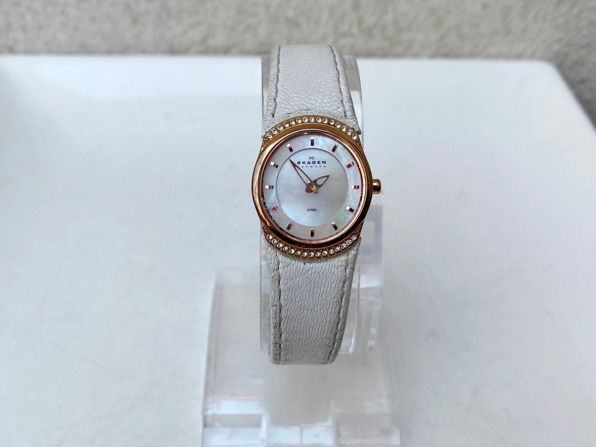 I Like Mikes Mid Century Modern Watches Skagen Women's Rose Gold Tone Round Watch Jeweled Mother of Pearl Dial White Leather Band