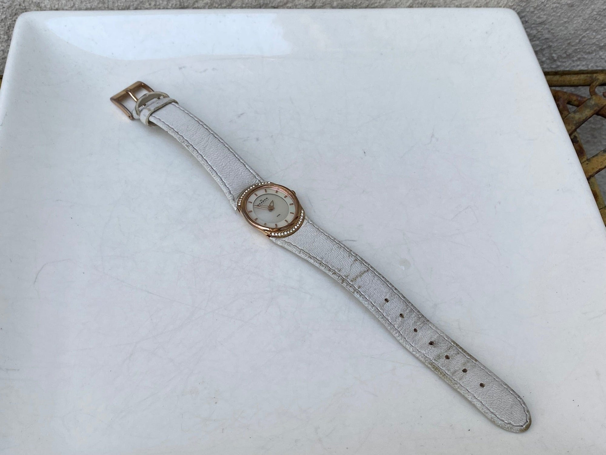 I Like Mikes Mid Century Modern Watches Skagen Women's Rose Gold Tone Round Watch Jeweled Mother of Pearl Dial White Leather Band