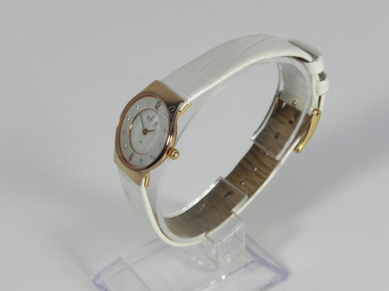 I Like Mikes Mid Century Modern Watches Skagen Women's Rose Gold Tone Round Watch Mother of Pearl Dial White Leather Band