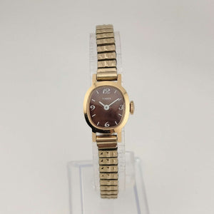 I Like Mikes Mid Century Modern Watches Timex Unisex Gold Tone Watch, Brown Oval Dial, Stretch Strap