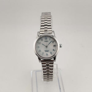 I Like Mikes Mid Century Modern Watches Timex Women's Silver Tone "Indiglo" Watch, Round Mother of Pearl Dial, Date Window, Stretch Strap