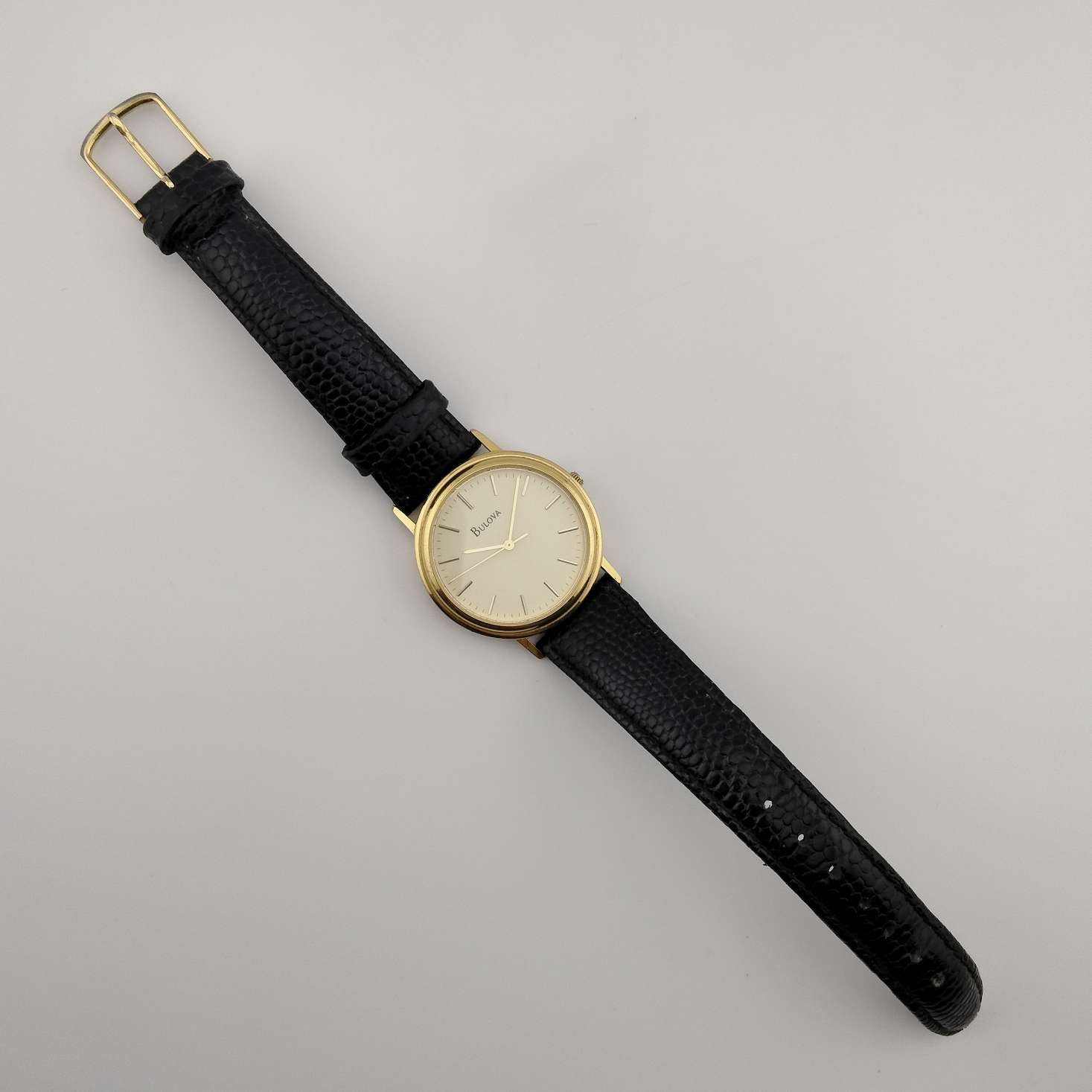 Unisex Bulova Gold Tone Watch, Circular Dial, Lizard Strap 