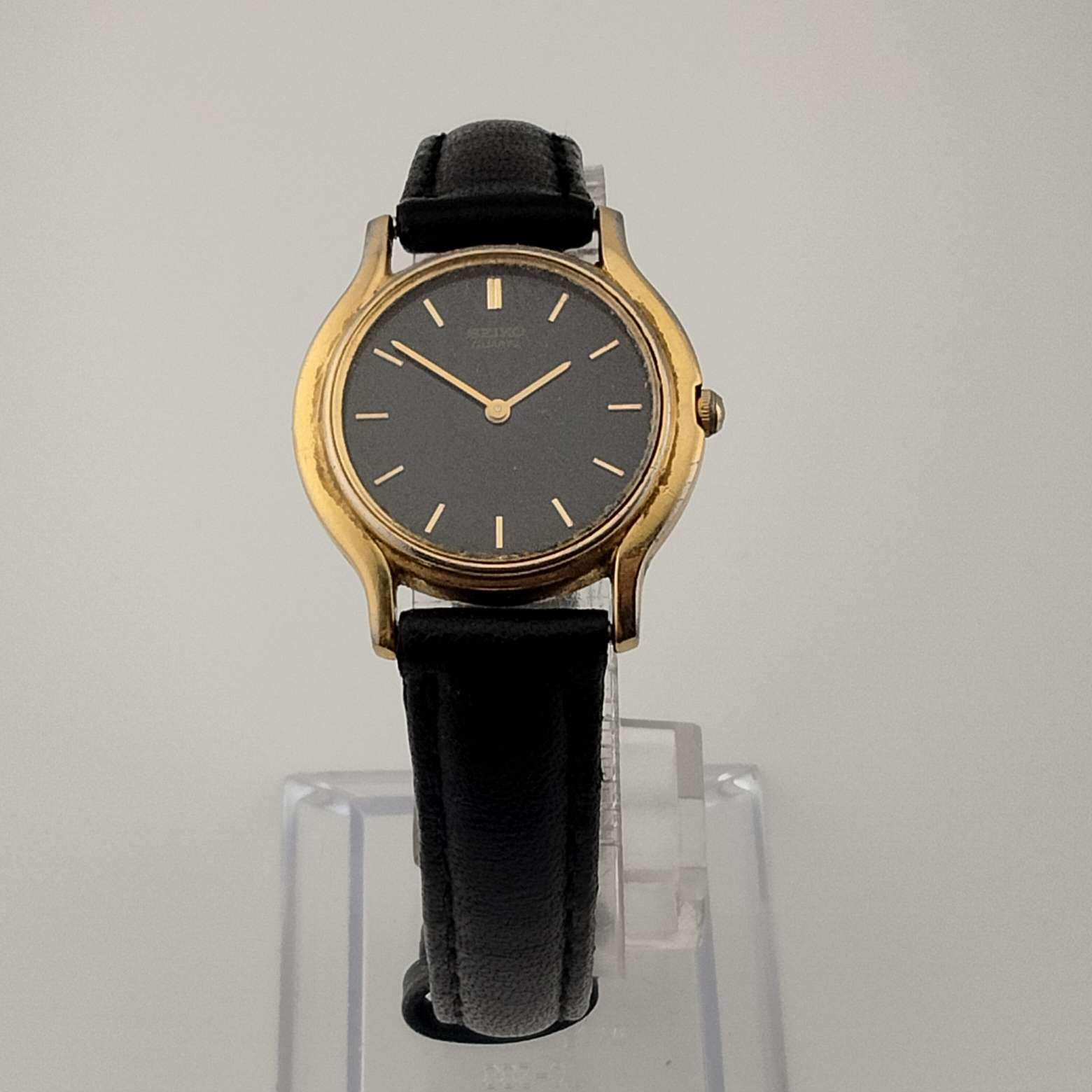 Seiko Quartz Women's Watch, Black Round Face with Gold Markers, Black Leather Strap