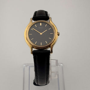Seiko Quartz Women's Watch, Black Round Face with Gold Markers, Black Leather Strap